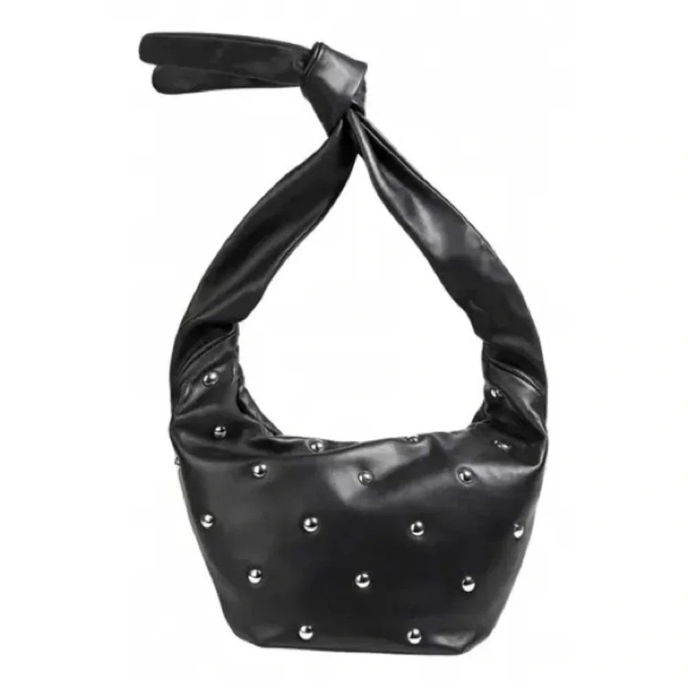 Maje “le bow bag” in black leather with silver studs